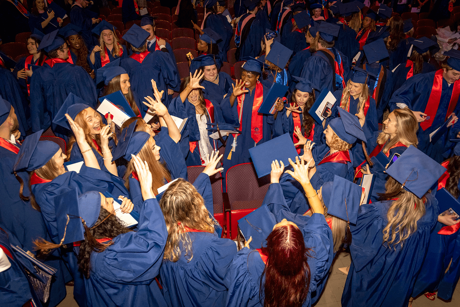 Meadows-Graduation-2023-hands-up