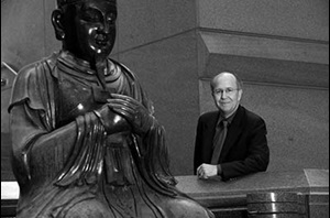 Dawson Orr with statue of Buddha