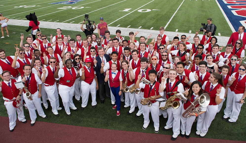 Full Mustang Band with SMU President R. Gerald Turner on Ford Stadium football field