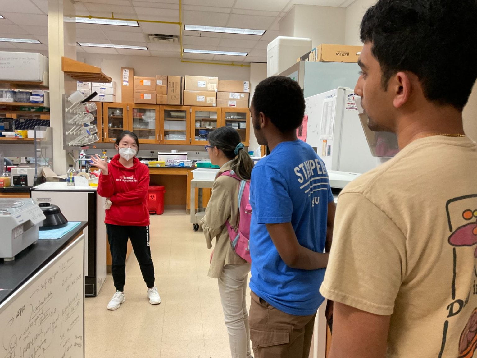 PhD student hosting students during Lab Hopping