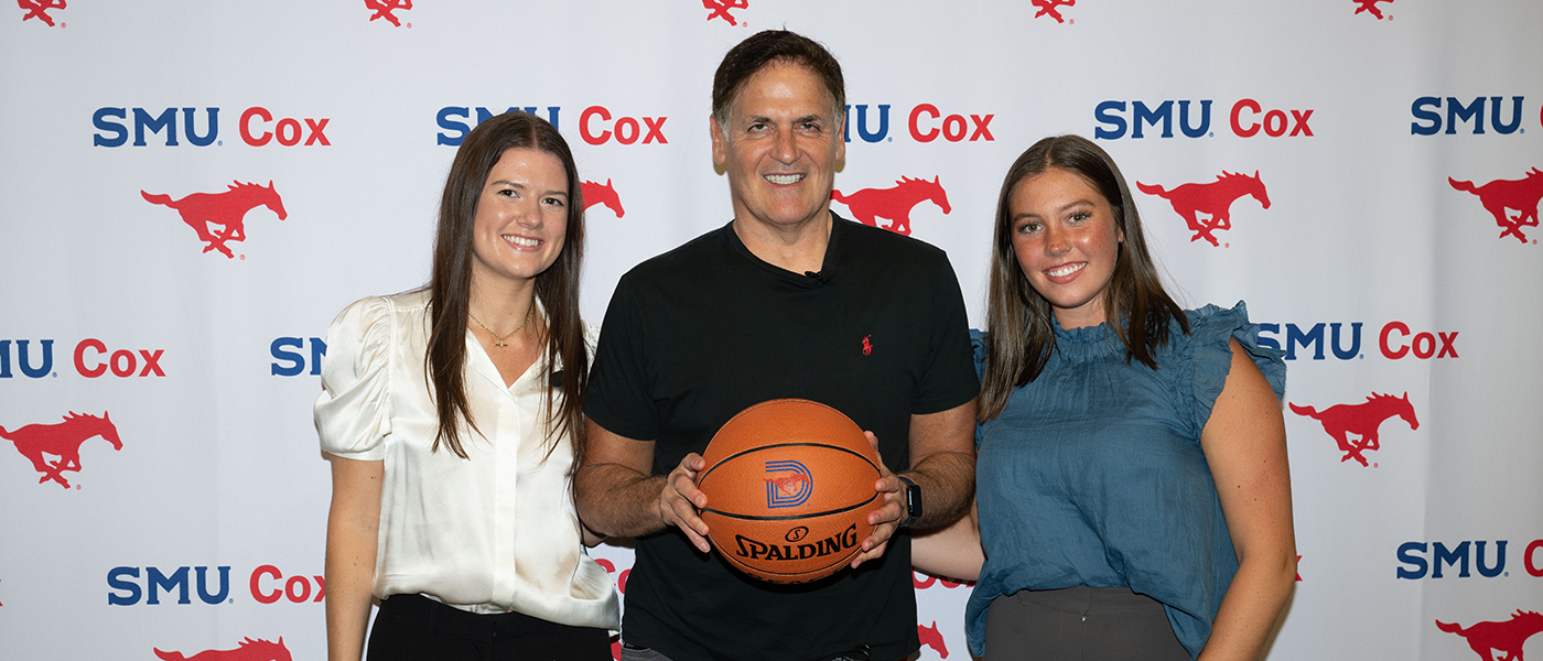 Photo of Mark Cuban with SMU Cox graduate students