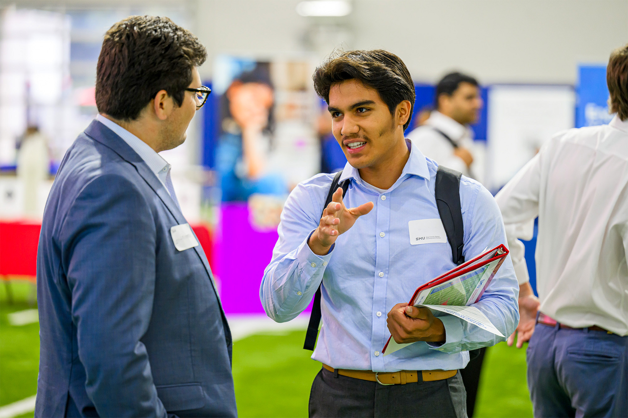student talking with employer at Career Fair