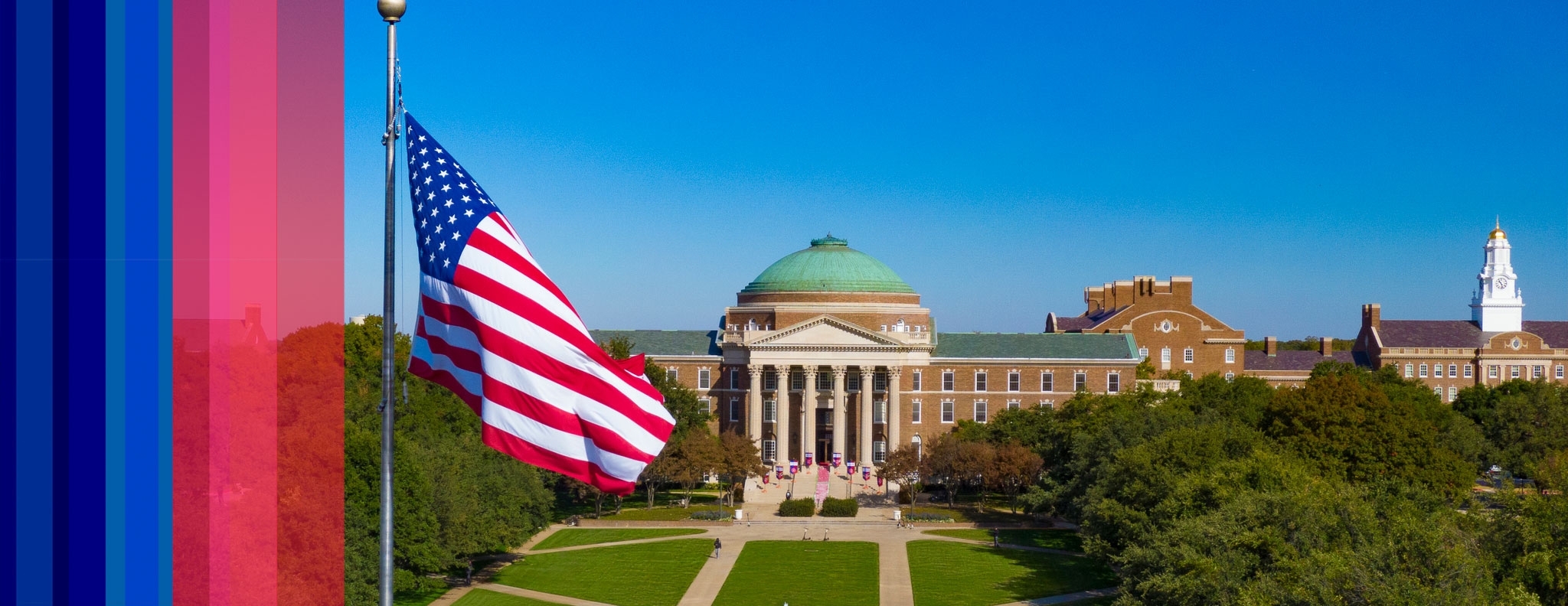 Dallas Hall with the flag