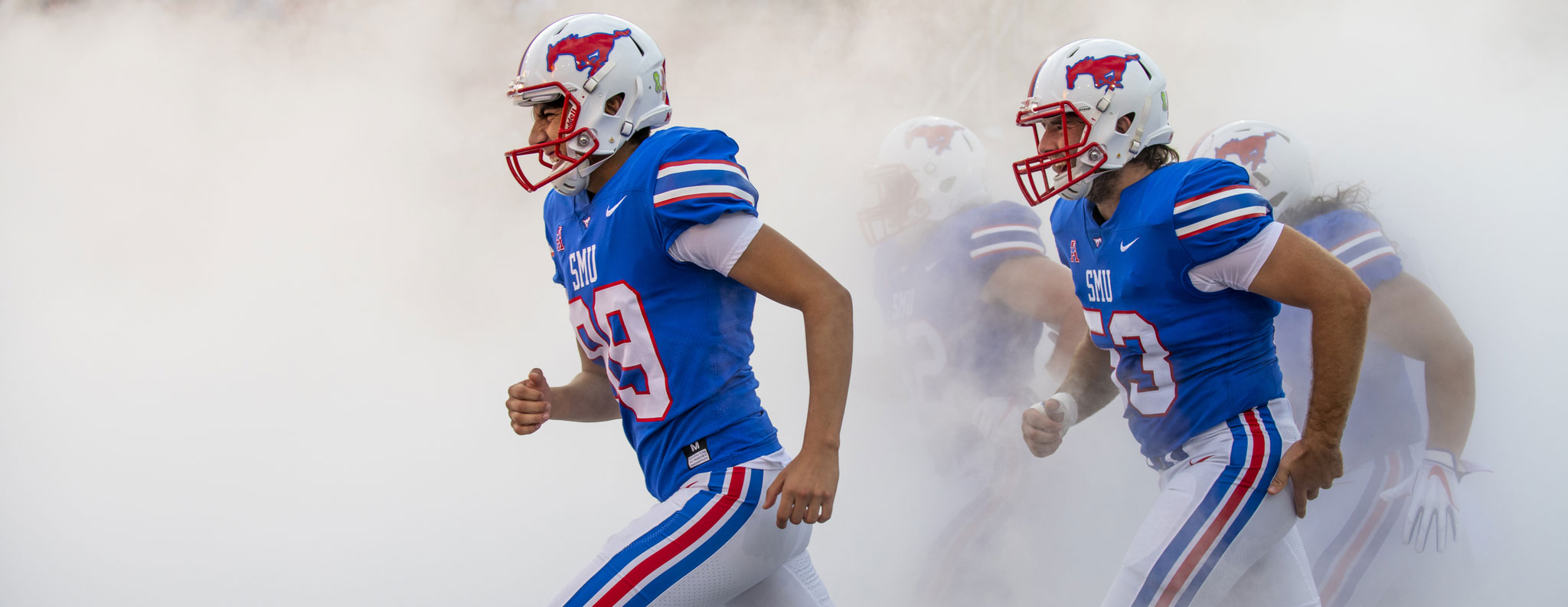 Football team entering field