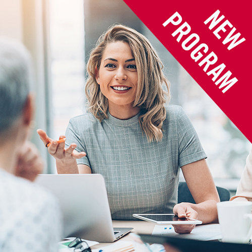 Image of a woman talking in a meeting with the words New Program on top of the image