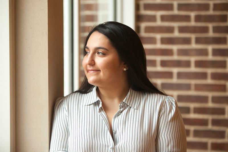 student at cox, looking out window