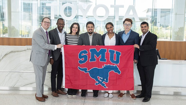 students with SMU banner