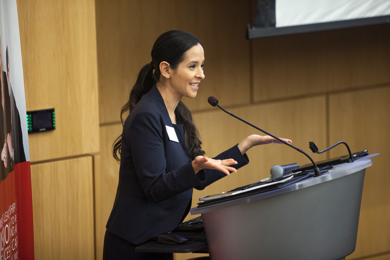 photo of Ana Rodriguez talking to participants