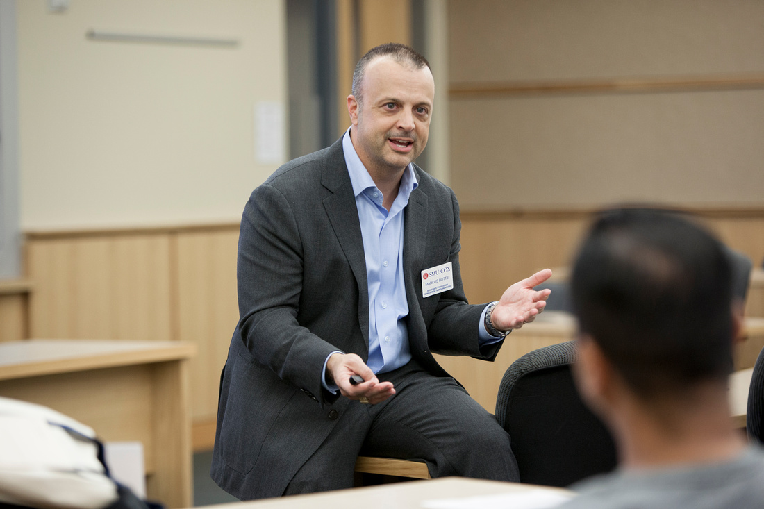 photo of professor Marcus Butts teaching at SMU Cox