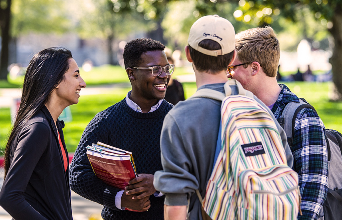 Students walking and having a conversation.