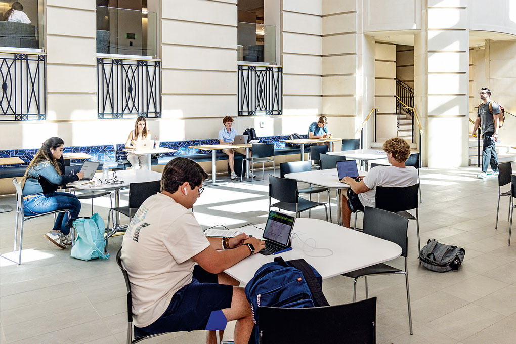 students studying in the Anita and Truman Arnold Dining Commons at SMU