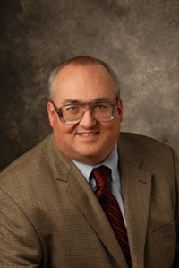 A headshot of Theodore Manikas, a member of the Lyle School of Engineering Faculty.