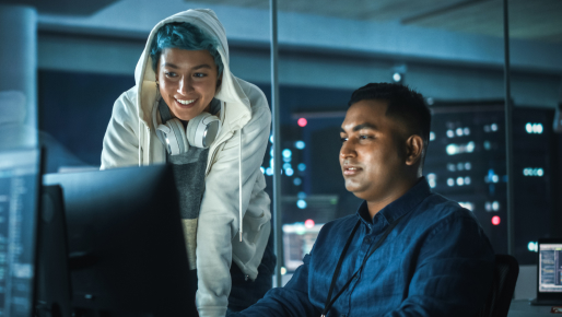 Two students working together at a computer