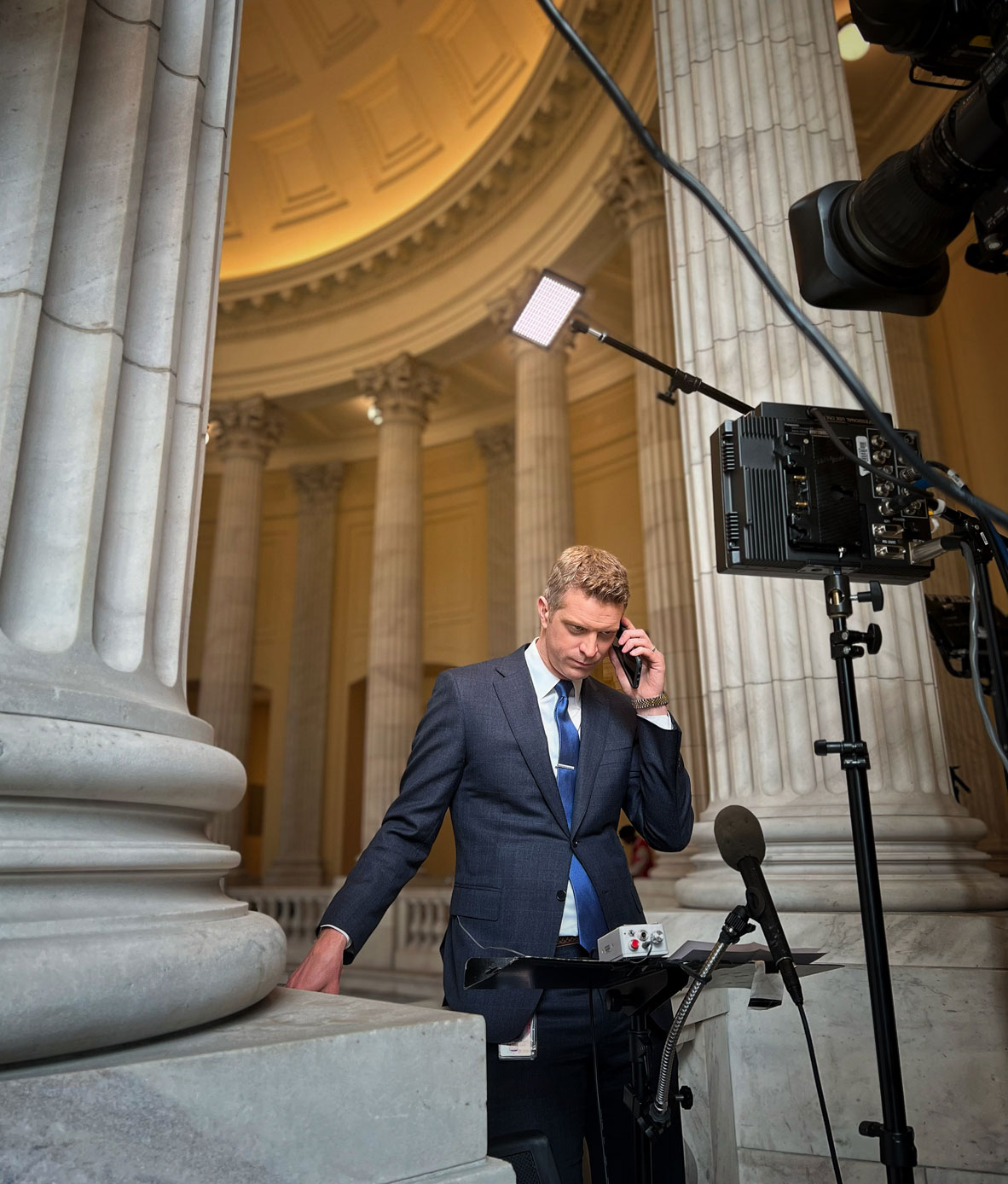 Alum Garrett Haake (B.A. '07) prepares for a broadcast in Washington, D.C.