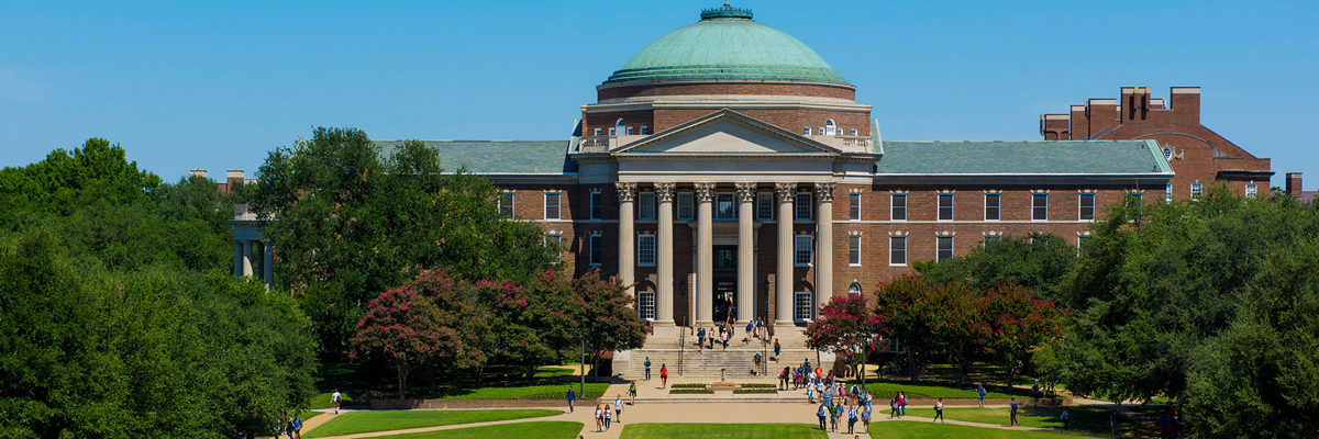 Aerial shot of SMU students walking to class on the quad. 