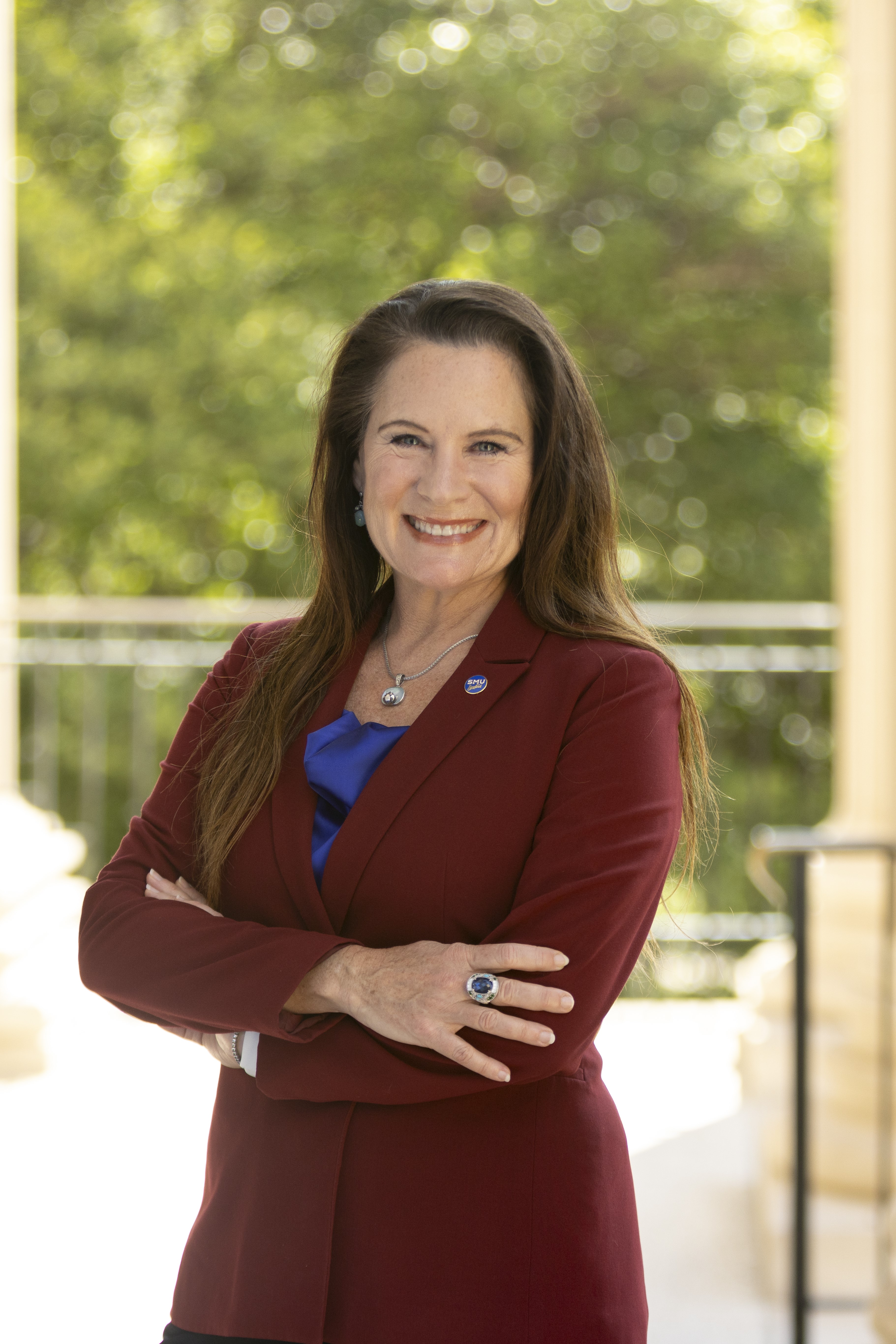 Portrait of Provost Loboa in front of the Dallas Hall columns