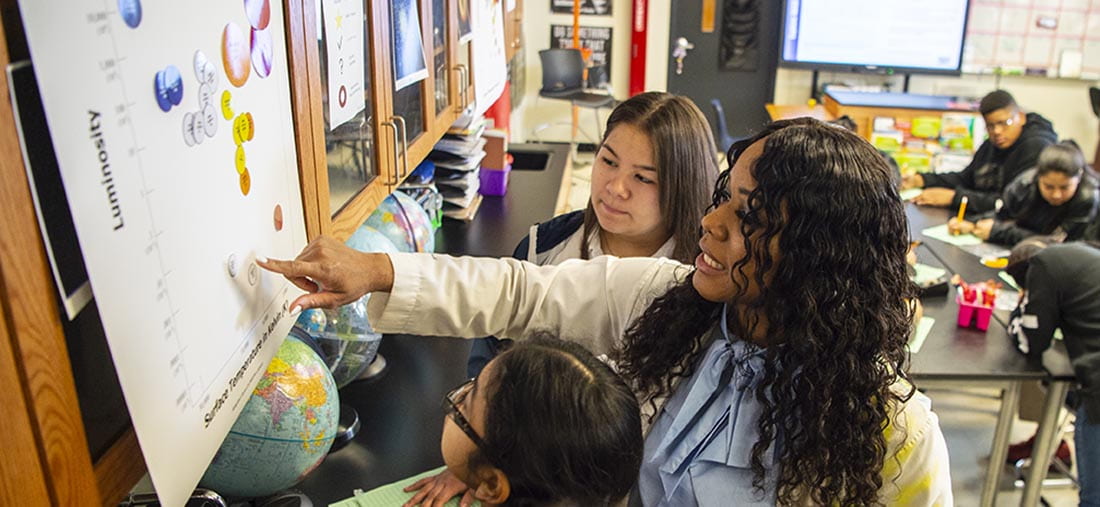 Simmons Toyota DISD STEM Teacher Elizabeth Blue White In Classroom In West Dallas