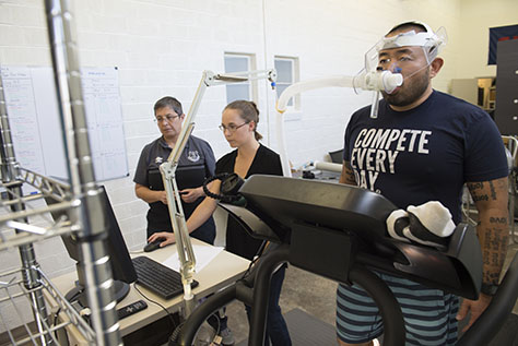 Jennifer Nollkamper & student monitor impact using clinical treadmill