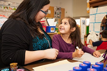 Simmons teacher with student