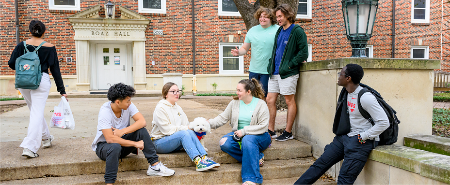 Students hanging out in front of Boaz Commons