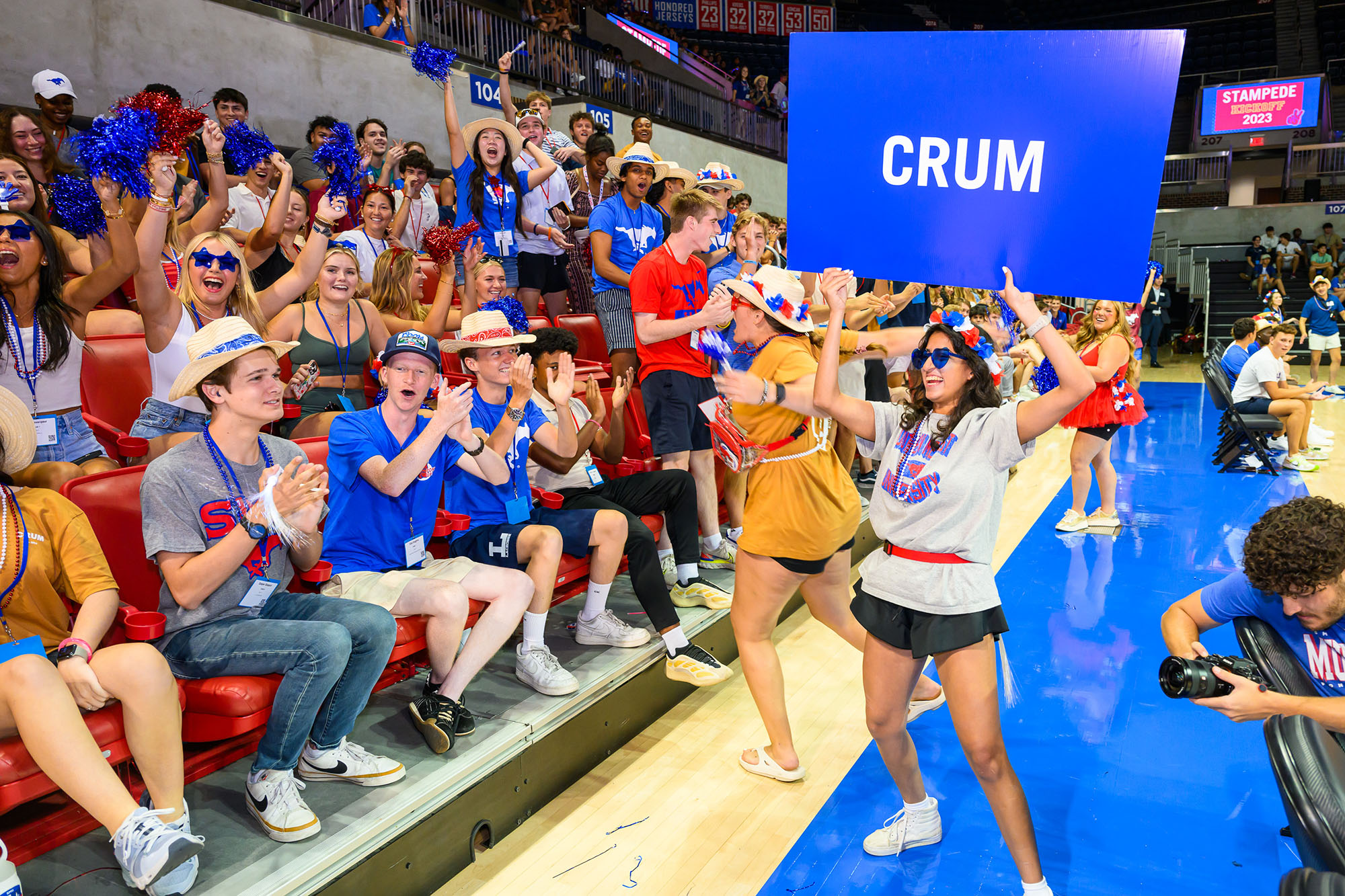 students in Crum Commons yelling for fun during stampede kickoff in moody coliseum