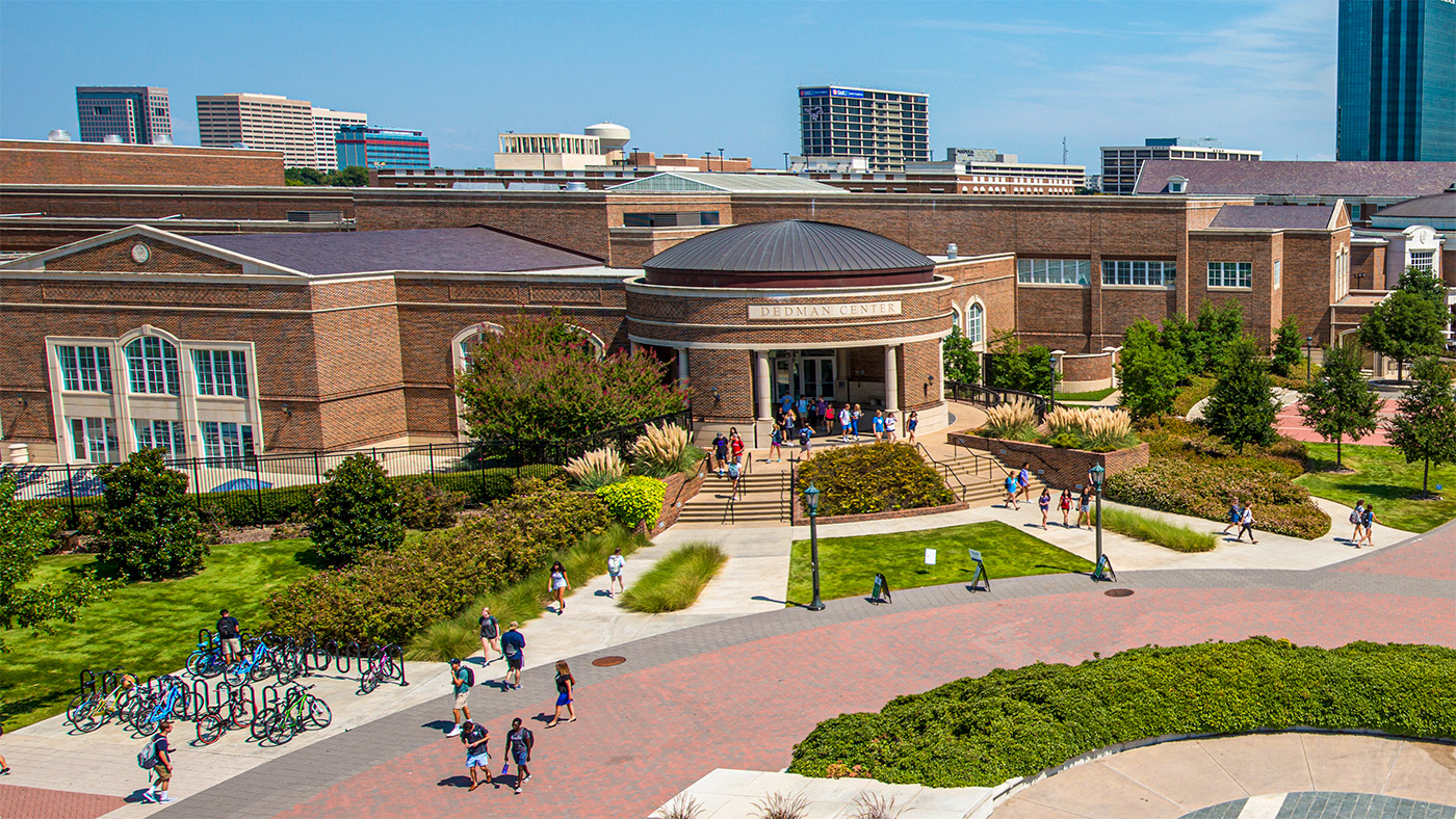 exterior of dedman center for lifetime sports with students walking outside