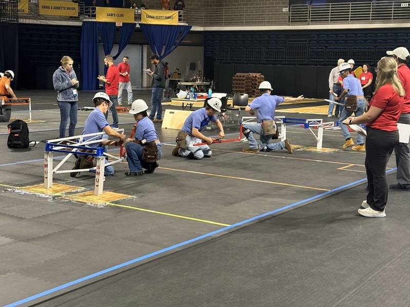 Students working on bridge